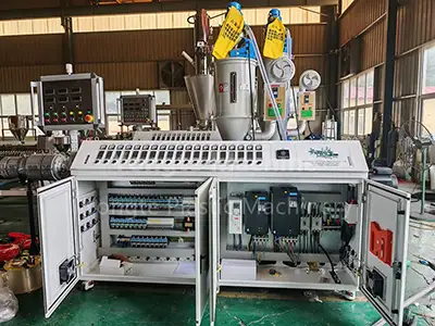 Recycled plastic lumber machine